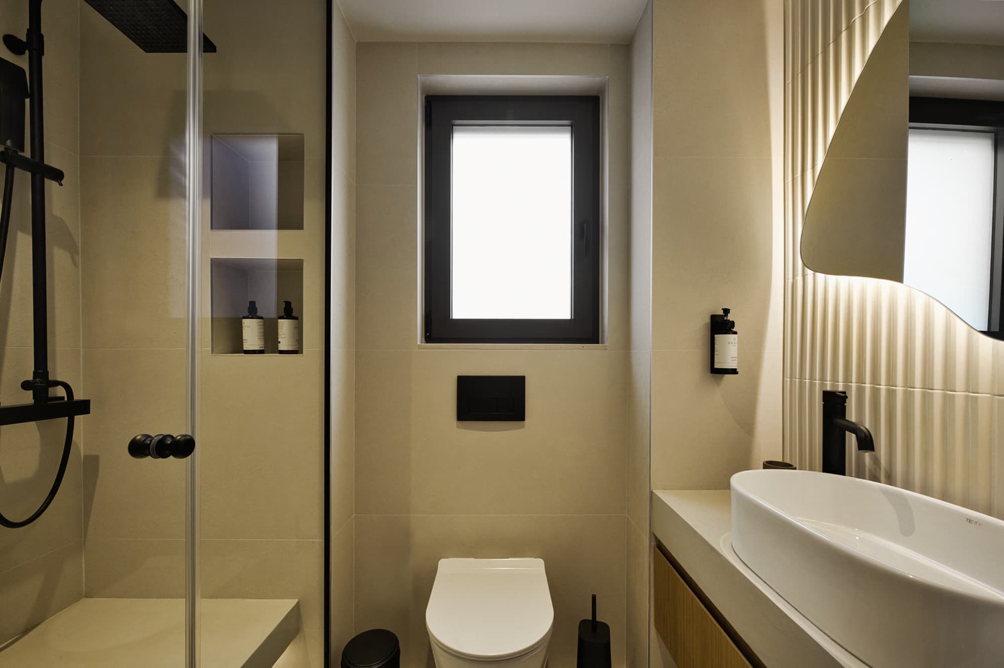 Revello Villa 1 shower room with walk-in shower and basin