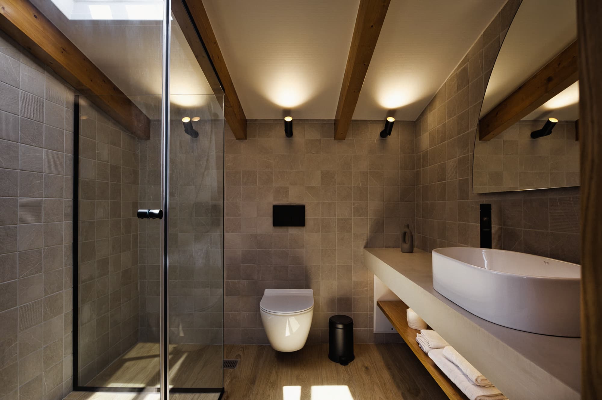 Revello Villa 1 stone-tiled bathroom with twin basins