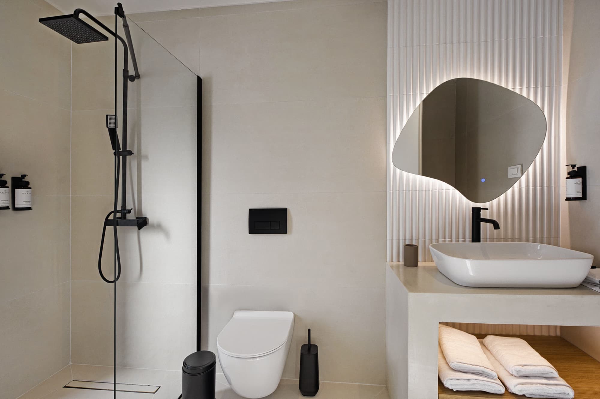 Revello Villa 2 bathroom with walk-in shower and backlit mirror