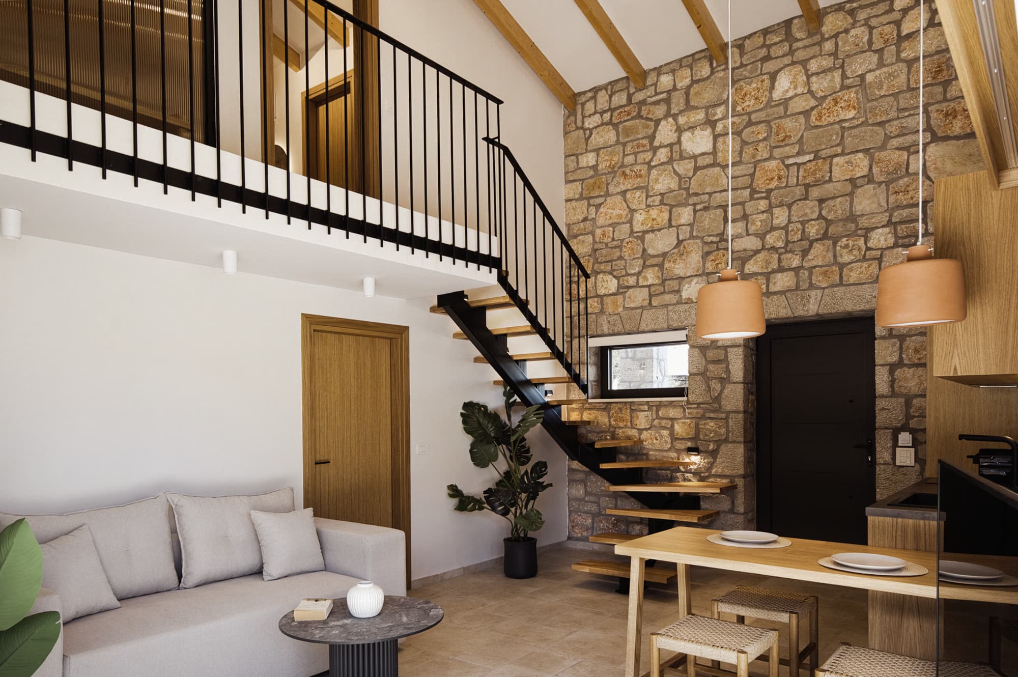 Revello Villa 2 open-plan living room under the mezzanine