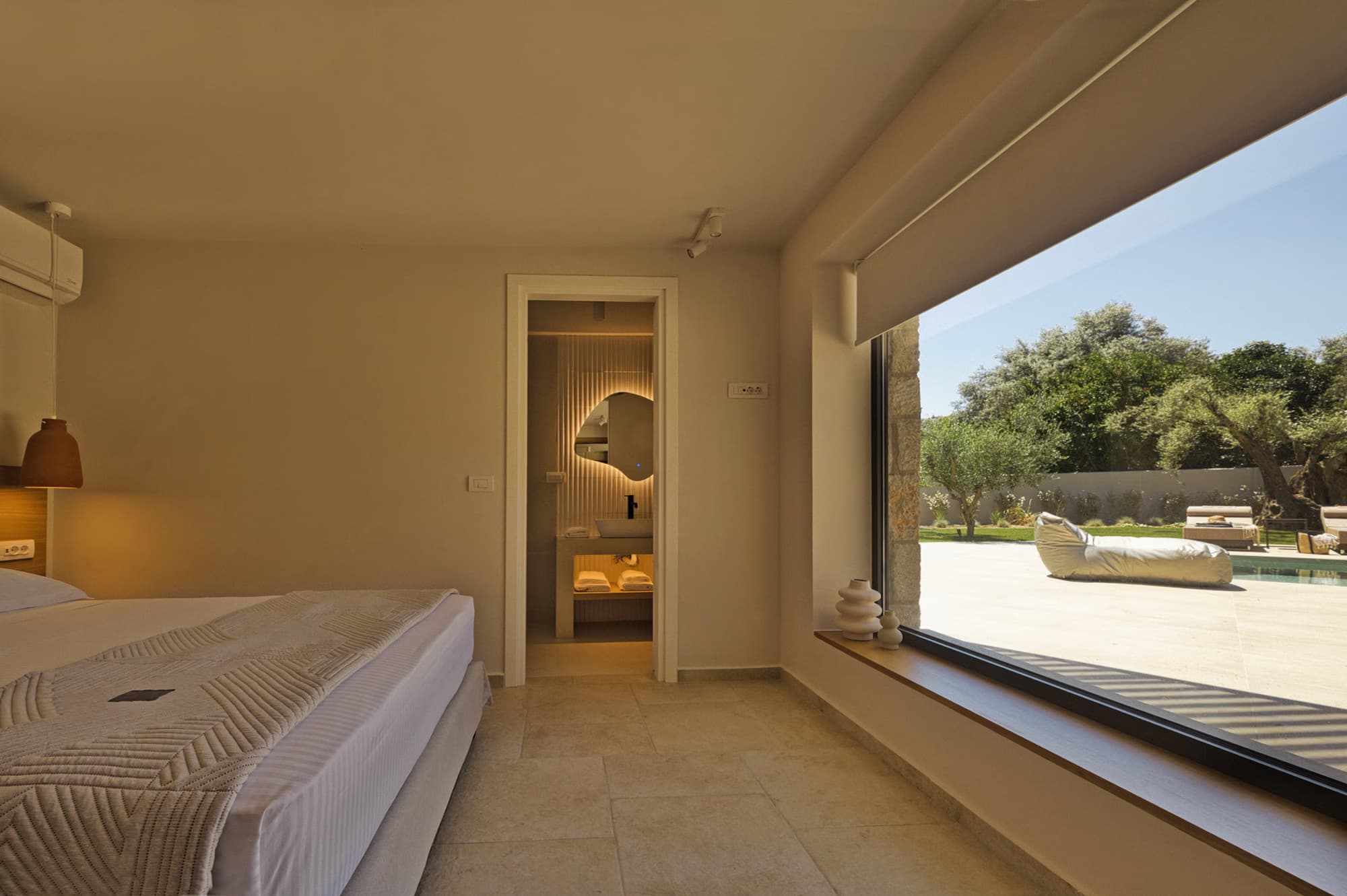 Revello Villa 3 bedroom with a picture window to the pool