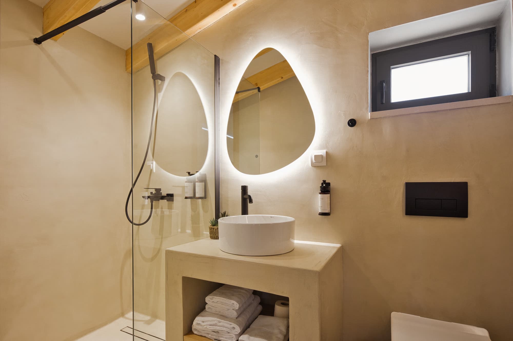 Revello Villa 3 bathroom with twin backlit mirrors